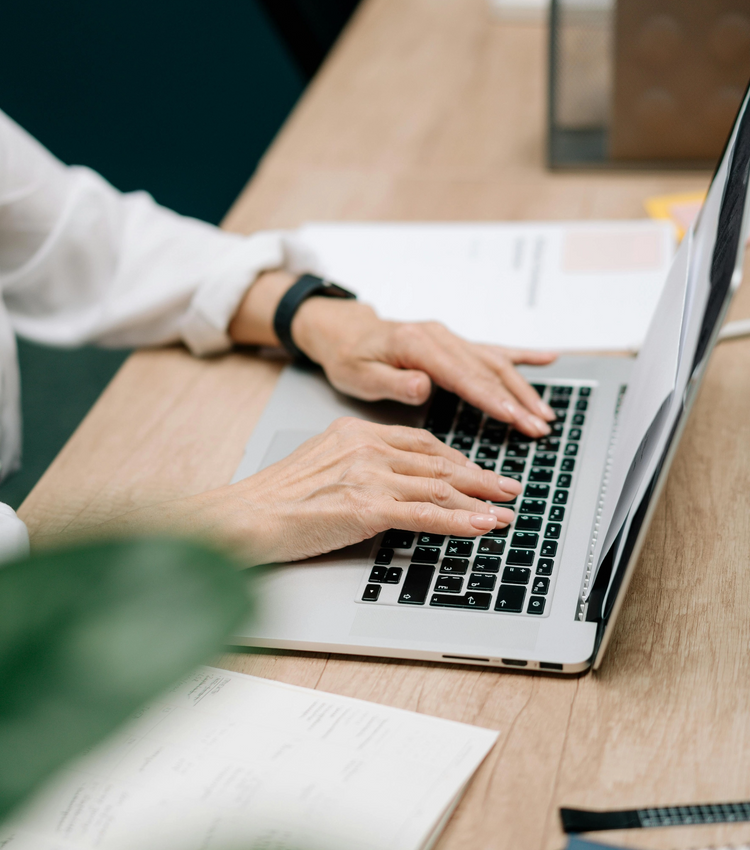 Hands on a laptop, deciding on a custom schedule to replenish your supply.